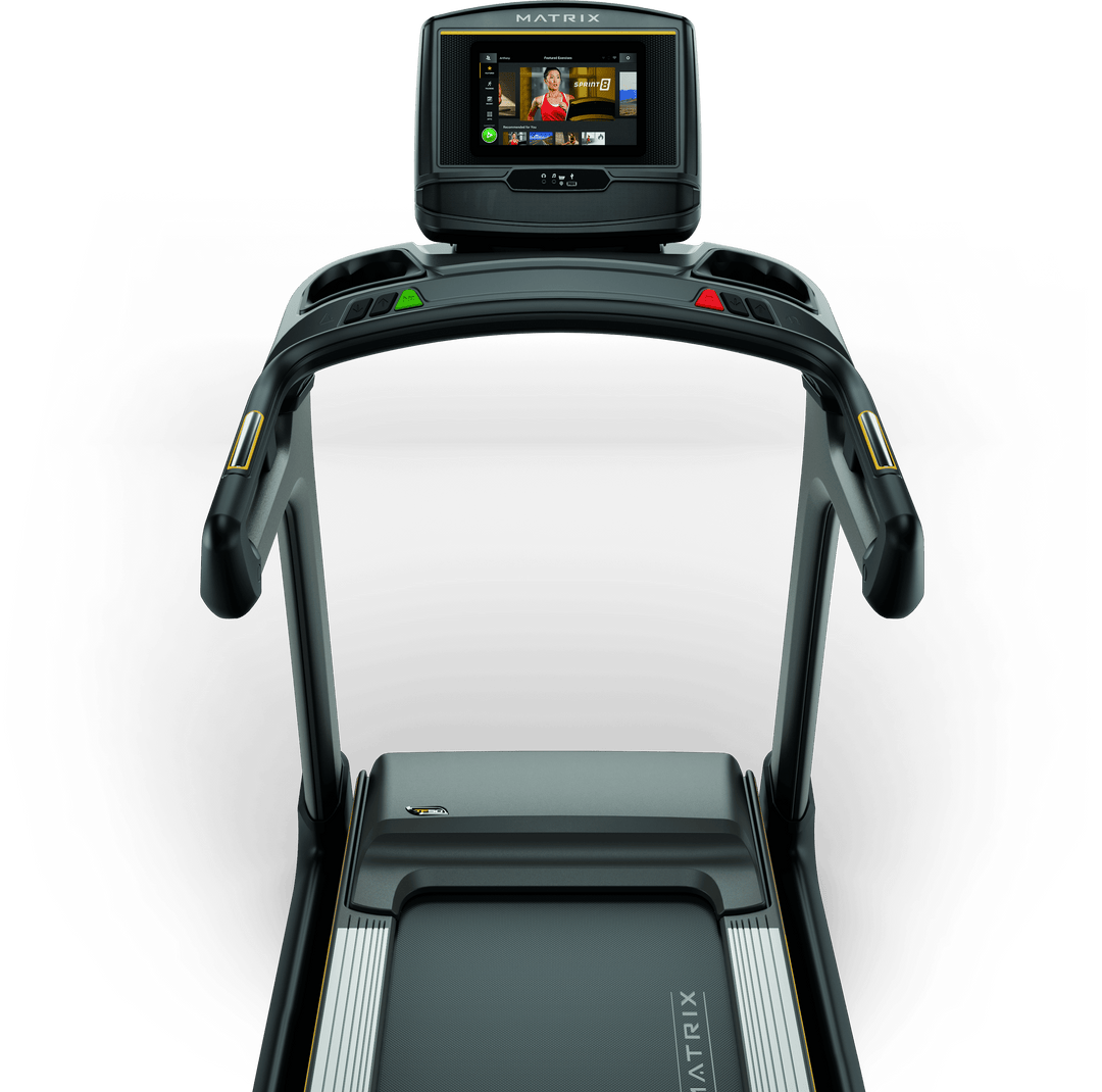 Front view of Matrix TF50 treadmill with XER console displaying workout metrics and ergonomic handlebar design