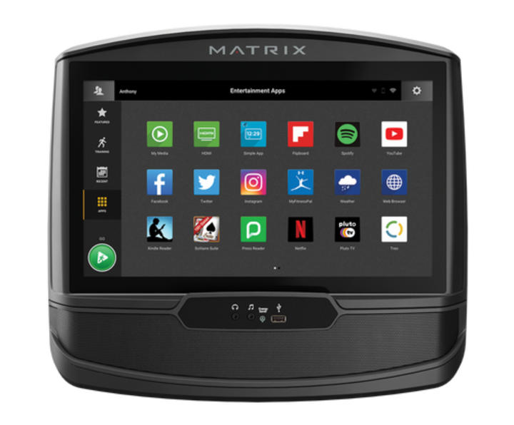 Matrix XIR console with touchscreen display showing entertainment apps and workout interface for cardio equipment