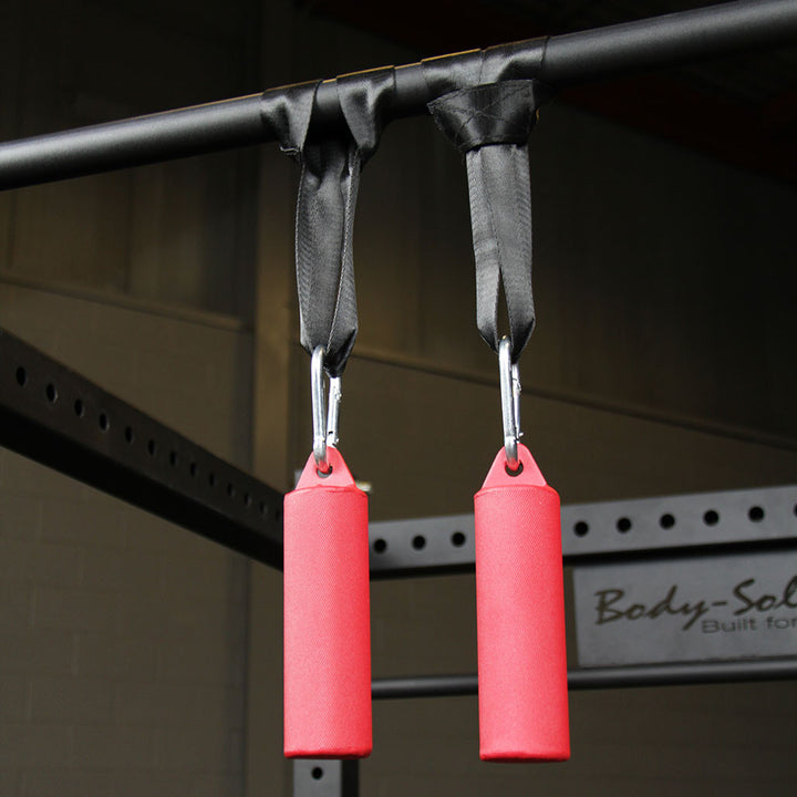 Body-Solid BSTNG nunchuck grips hanging from a pull-up bar.