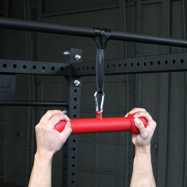 Close-up of the Body-Solid BSTDB dog bone grip trainer used for neutral grip pull-ups.