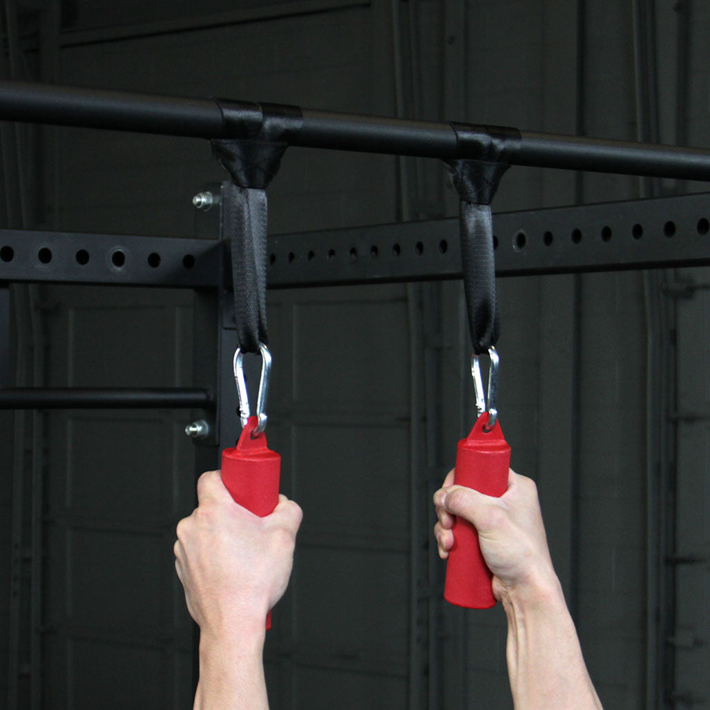 Person using Body-Solid nunchuck grips attached to a pull-up bar.