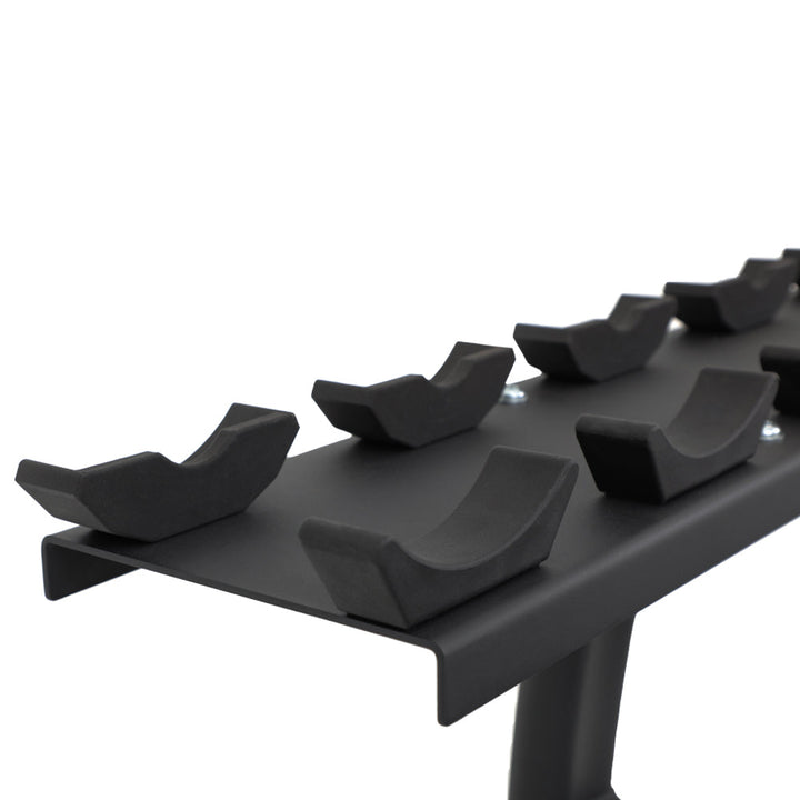 Close-up of protective nylon dumbbell saddle on commercial rack