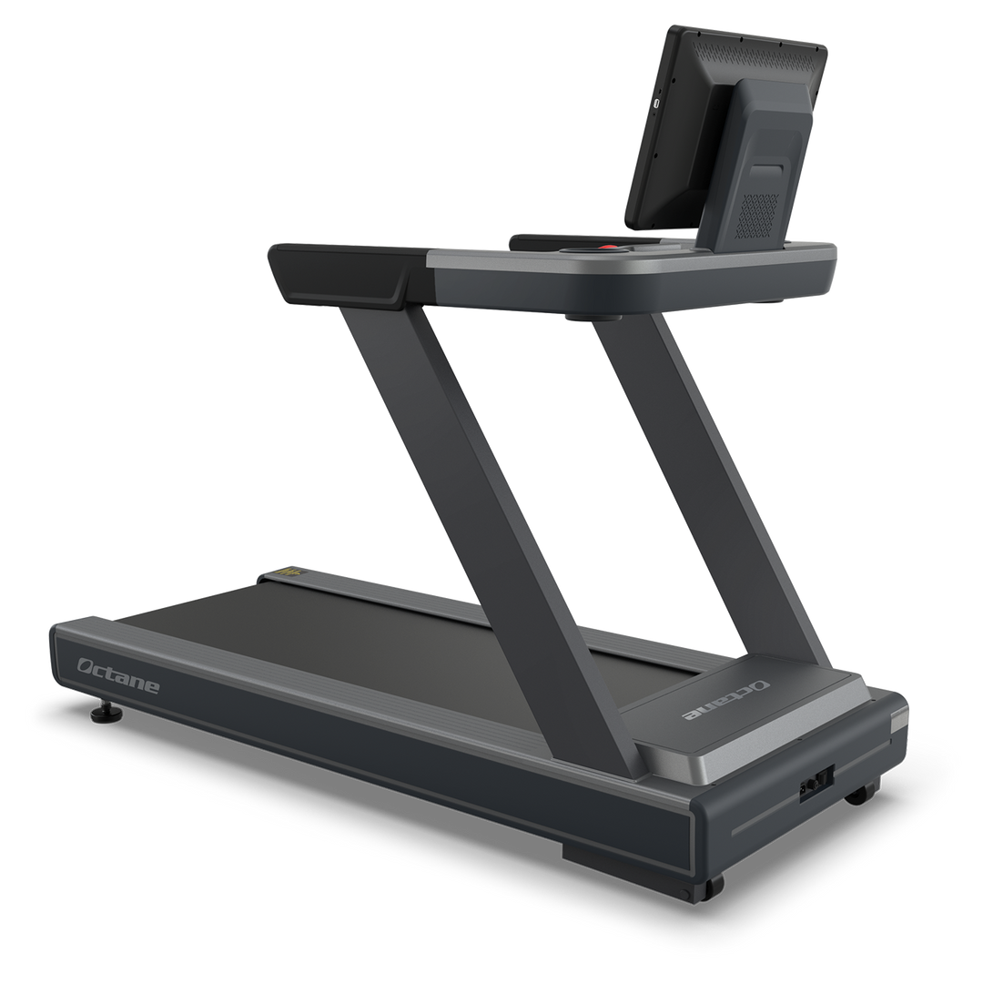 Octane OC220 treadmill shown from a rear angle with running deck and touchscreen