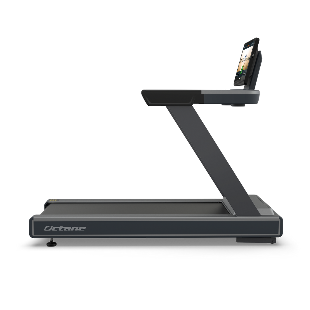 Side view of Octane OC220 treadmill with running deck and touchscreen console