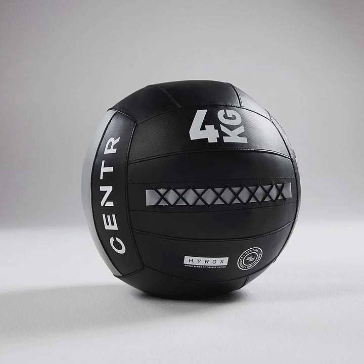 Side profile of the Centr x HYROX Official Wall Ball with textured PVC shell.