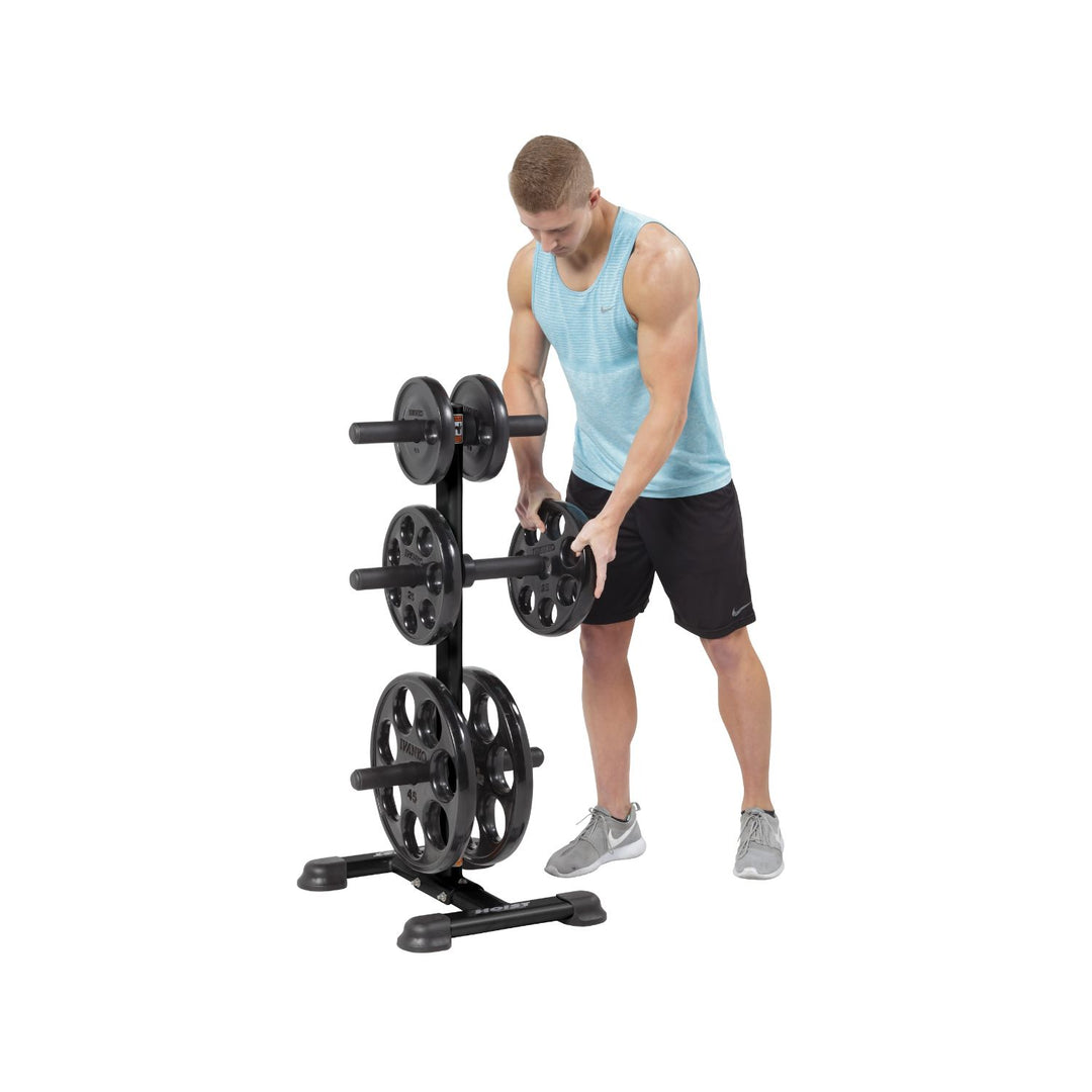 Olympic weight tree storage rack with user adding plates for easy access and organized home gym use