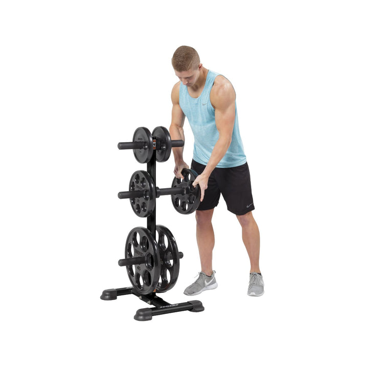 Olympic weight tree storage rack with user adding plates for easy access and organized home gym use