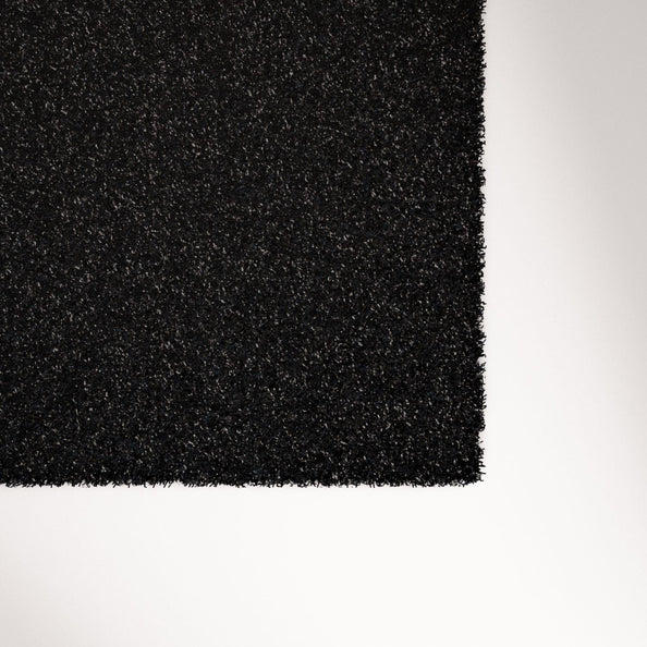 Close-up of the Centr x HYROX Perform Turf textured surface for sled training.