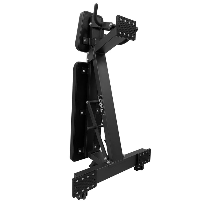 Black adjustable power bench standing upright in its vertical storage position
