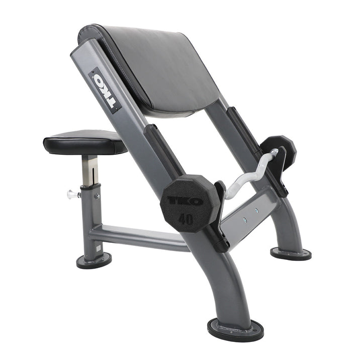 Front angle view of TKO preacher curl bench with adjustable seat