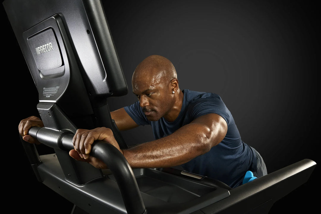 User performing Push Mode resistance training on the Precor Breakaway commercial treadmill.