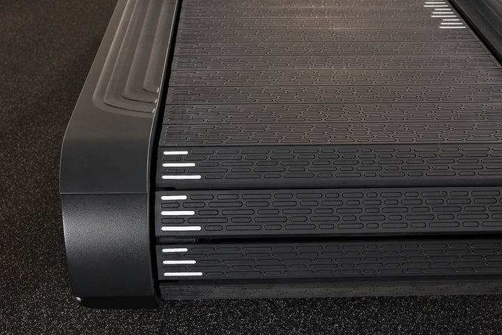Close-up of the slat running surface on the Precor Breakaway commercial treadmill.
