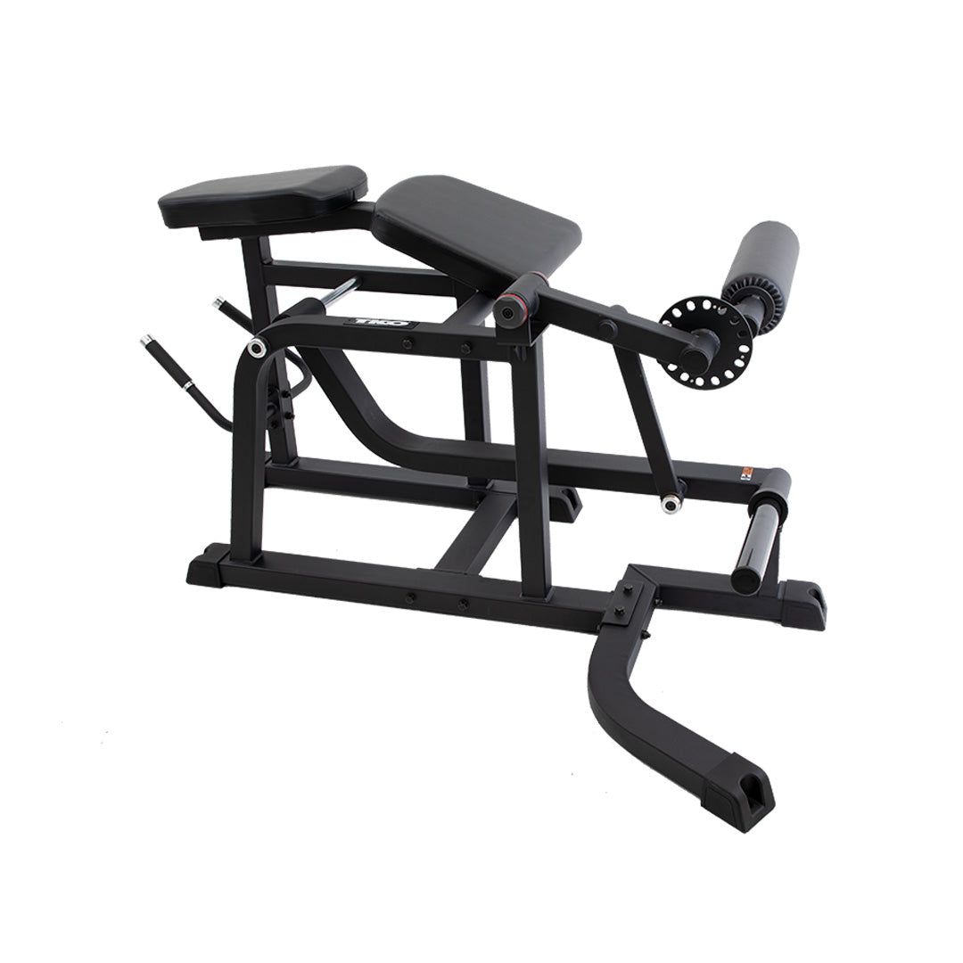 Prone leg curl machine with adjustable leg pad and steel frame.