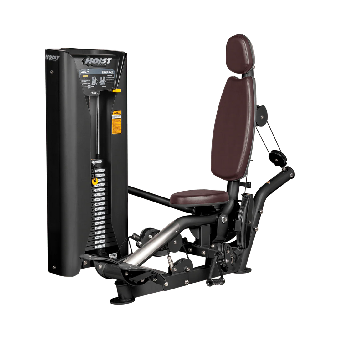 Hoist commercial biceps curl machine with red seat and backrest, ergonomic arm pad, and plate-loaded resistance system for isolated arm training