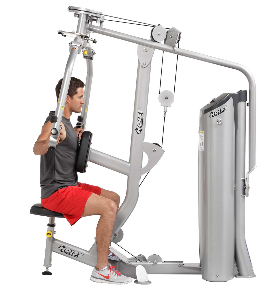 person using rear delt machine performing reverse fly for shoulder training