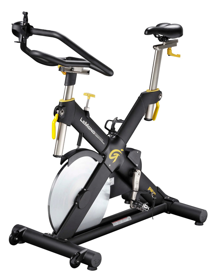 rear perspective of RevMaster Pro Cycling Bike featuring durable frame construction and adjustable riding positions