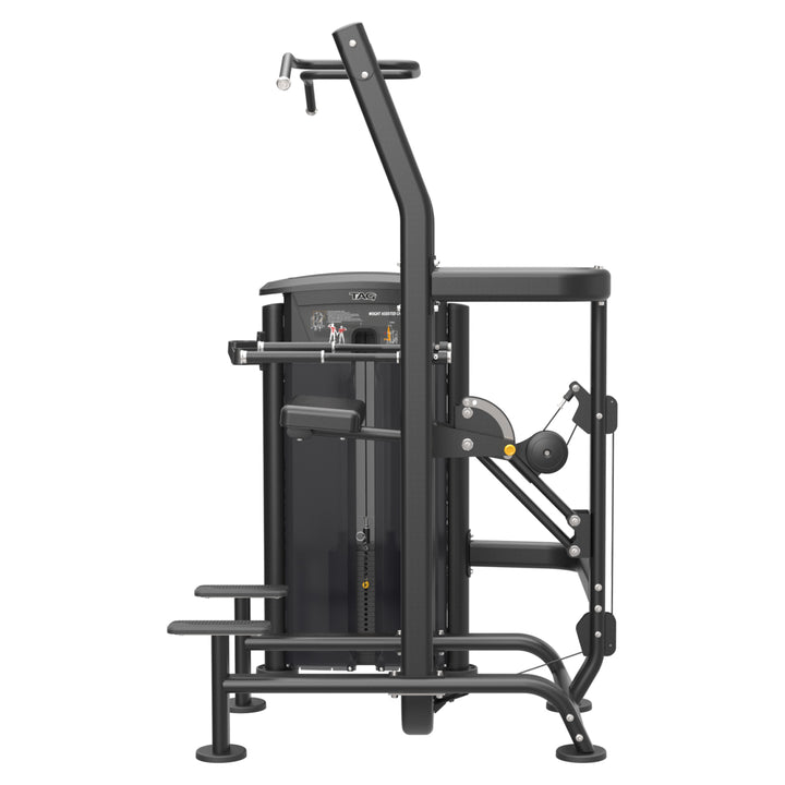 Side view of TAG Fitness ELITE chin/dip assist machine showing the frame, weight stack, platform, and exercise handles
