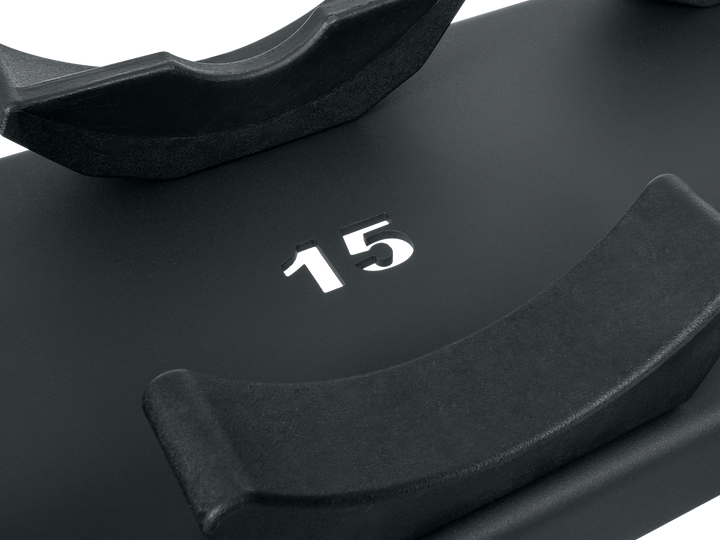 Close-up of TAG dumbbell saddle rack with laser-cut weight numbering on the saddle