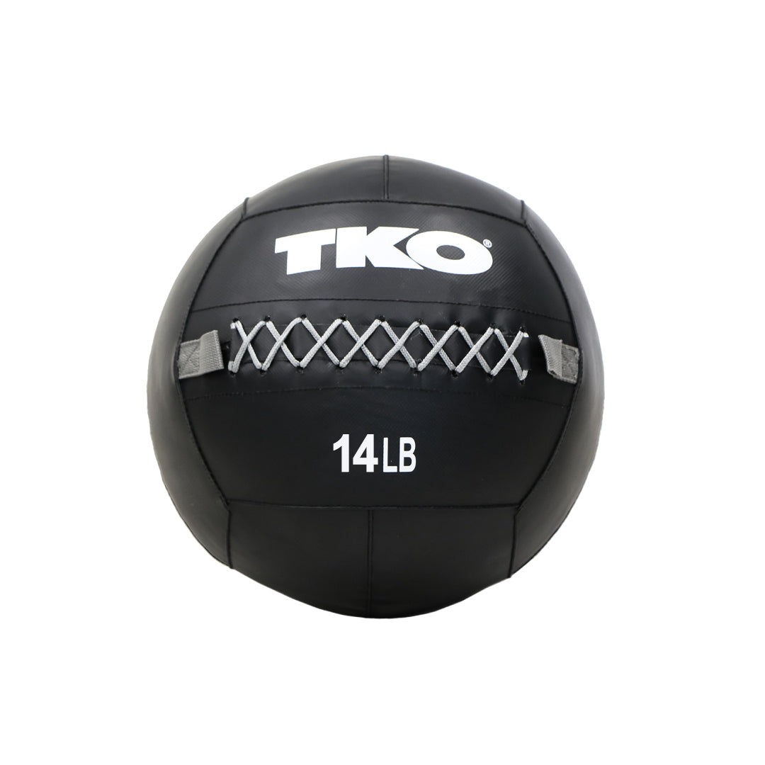 TKO 14 lb wall ball designed for strength and conditioning workouts