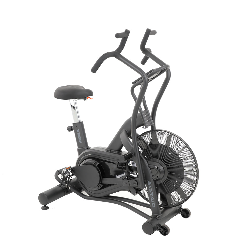 TKO AirRaid fan exercise bike with air resistance system and dual-action handlebars for commercial cardio and HIIT workouts