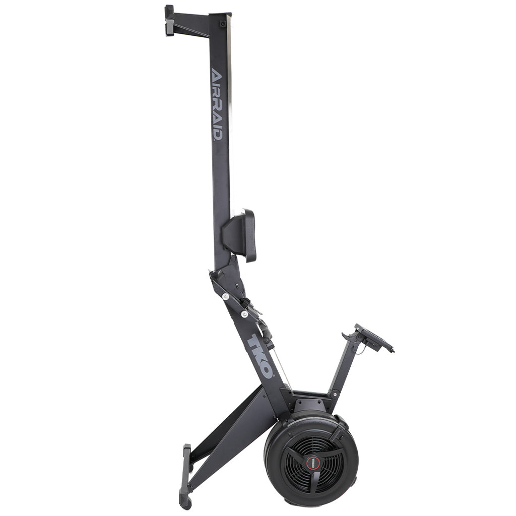 TKO AirRaid rowing machine shown in vertical storage position for space-saving commercial gym storage
