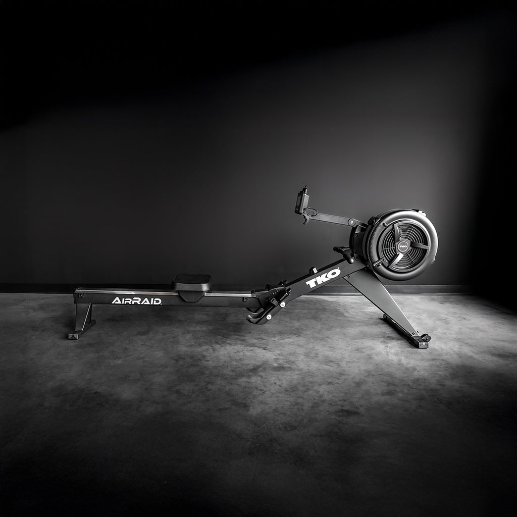 TKO AirRaid commercial rowing machine displayed in premium training studio for endurance and HIIT cardio workouts