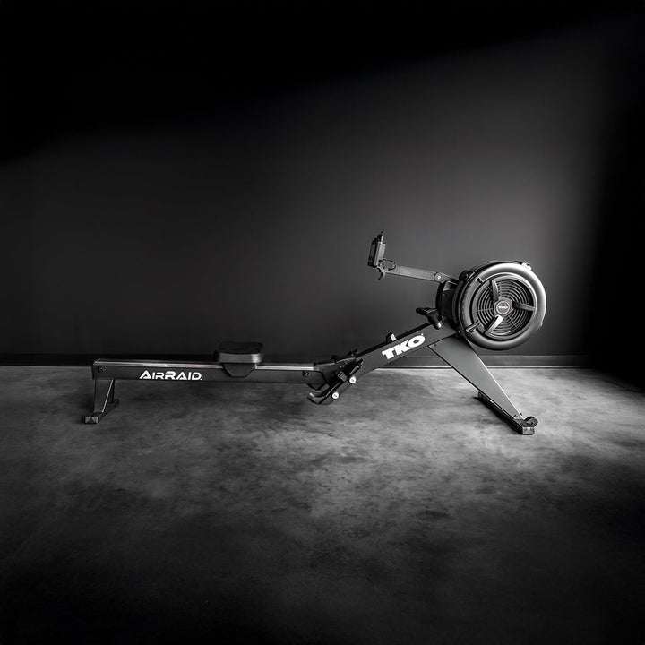 TKO AirRaid commercial rowing machine displayed in premium training studio for endurance and HIIT cardio workouts