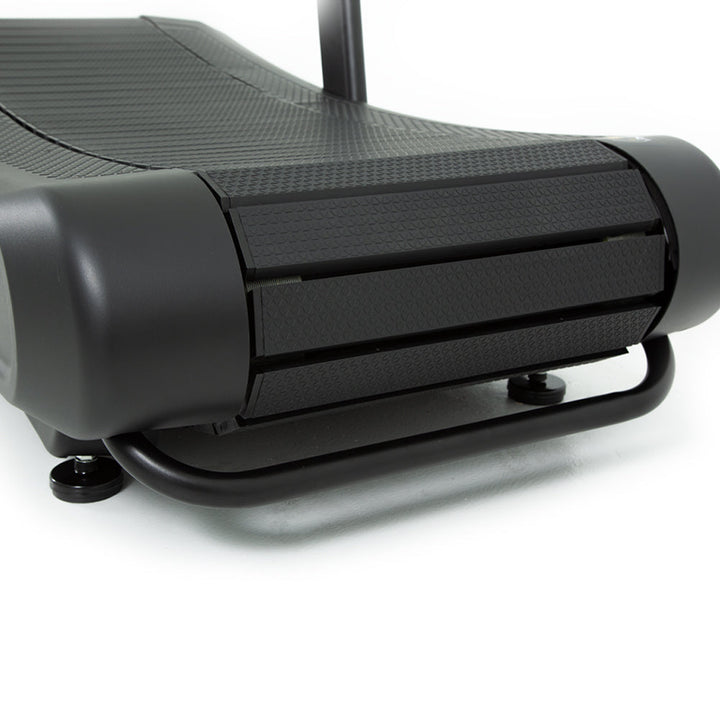 side close-up of curved slat belt running surface on TKO AirRaid manual treadmill for smooth natural stride movement