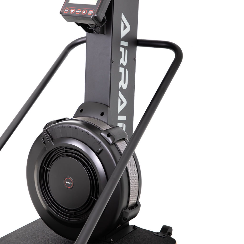 side profile of TKO AirRaid ski trainer showing compact footprint and air resistance drive system for commercial fitness facilities
