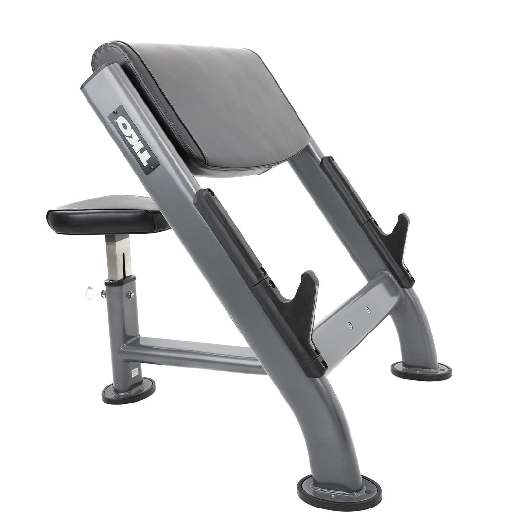 TKO preacher curl bench with adjustable seat and angled arm pad