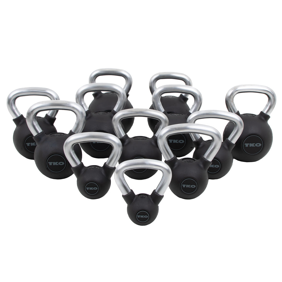 Multiple TKO rubber kettlebells displayed in assorted sizes