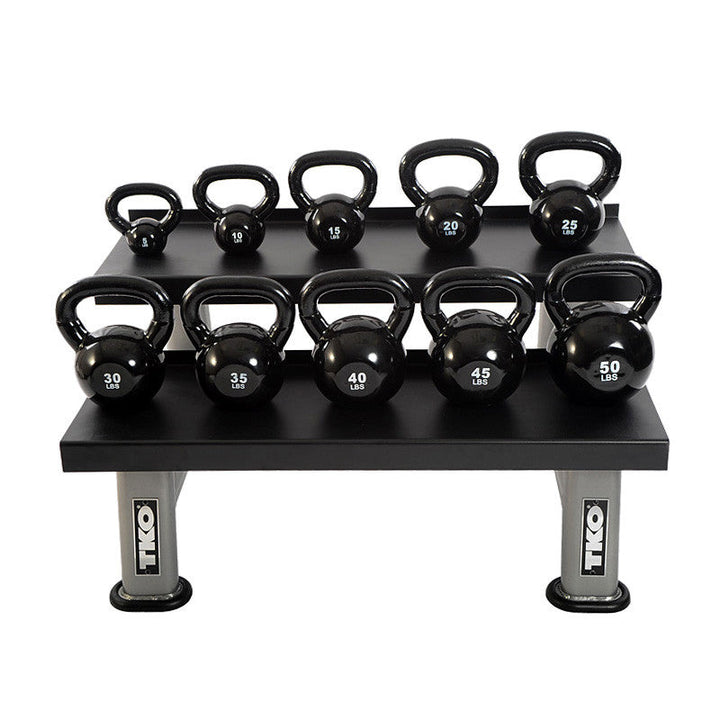 Vinyl coated kettlebell collection organized on storage rack
