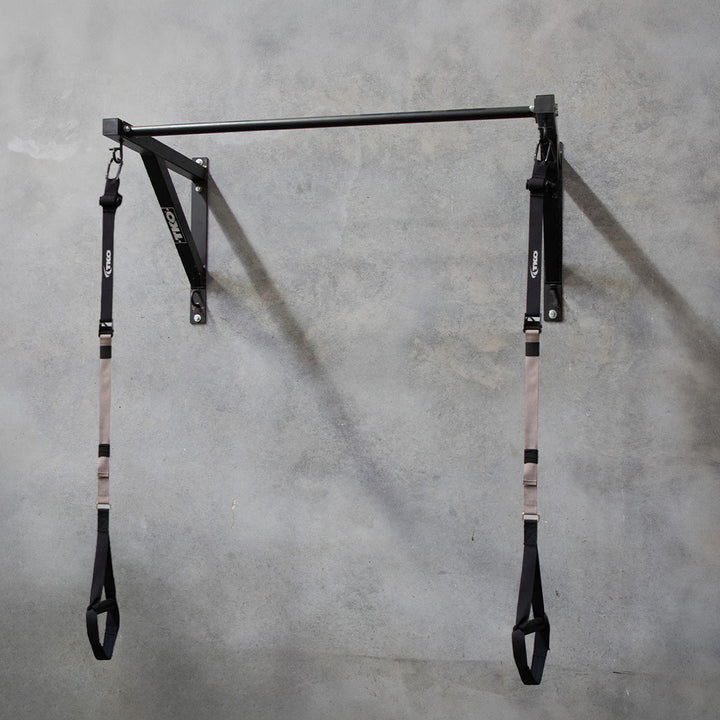 Installed TKO Wall Mount Pull-Up System with suspension straps on wall