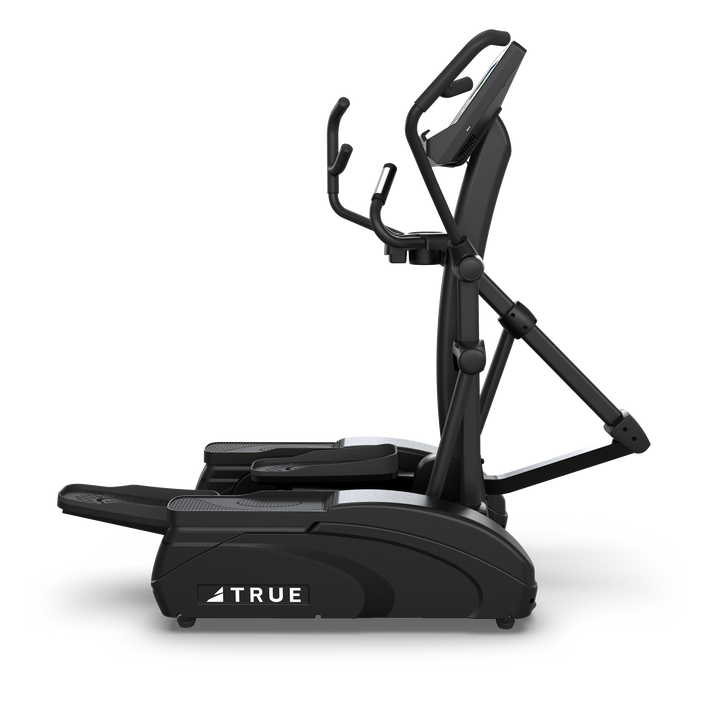 Side view of TRUE M50 elliptical showing compact frame, pedals, handles, and console
