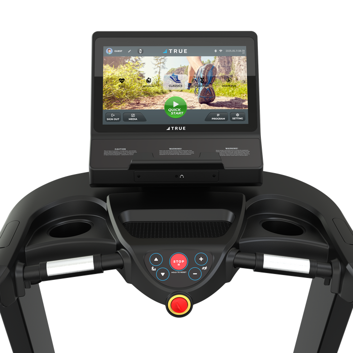 TRUE Performance 3000 treadmill touchscreen displaying workout content above the control panel.