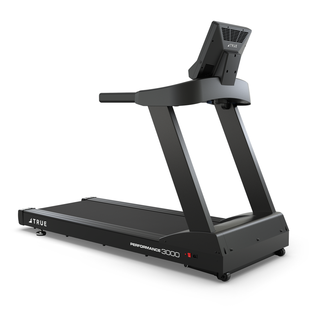 TRUE Performance 3000 treadmill shown from a rear angle with running deck, frame, and touchscreen console.