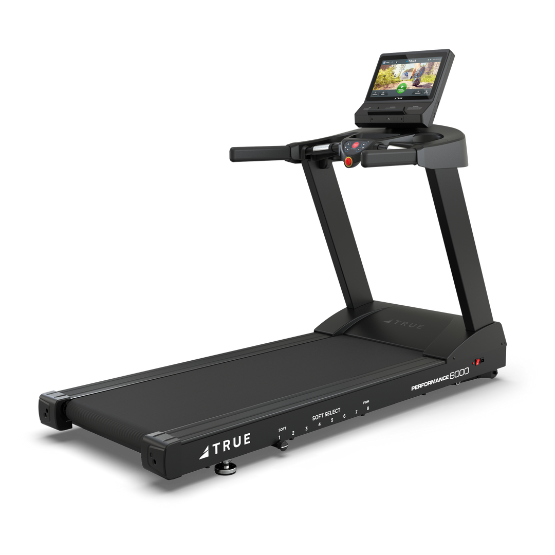 TRUE Performance 8000 treadmill shown from the front angle with touchscreen console and running deck.