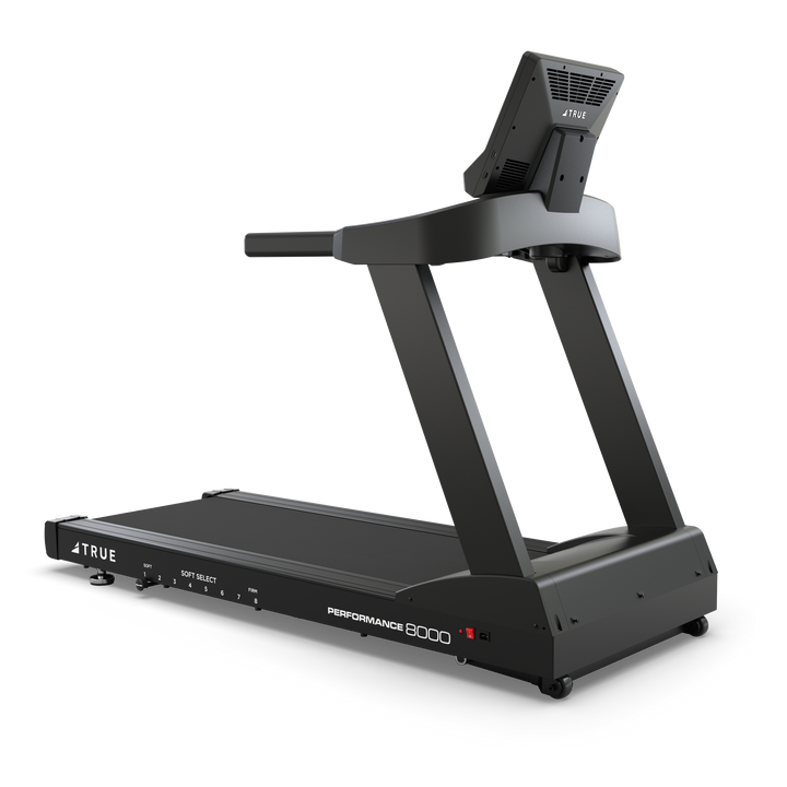 TRUE Performance 8000 treadmill shown from a rear angle with running surface and upright console.