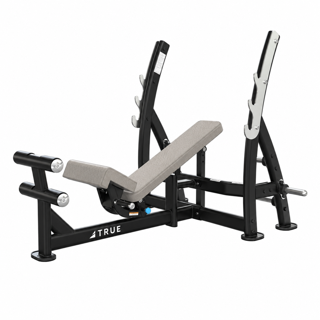 TRUE XFW-8200 3-way bench press with alabaster upholstery, bar catches, footrest, and plate holders  
