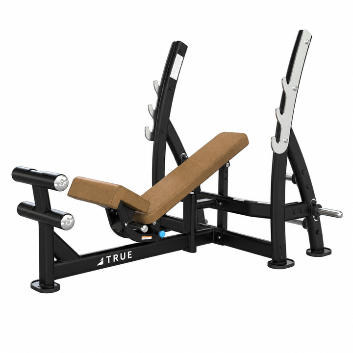 TRUE XFW-8200 3-way bench press with camel upholstery, bar catches, footrest, and plate holders  