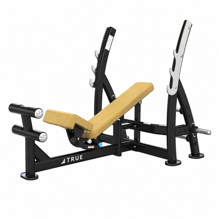 TRUE XFW-8200 3-way bench press with desert tan upholstery, bar catches, footrest, and plate holders  