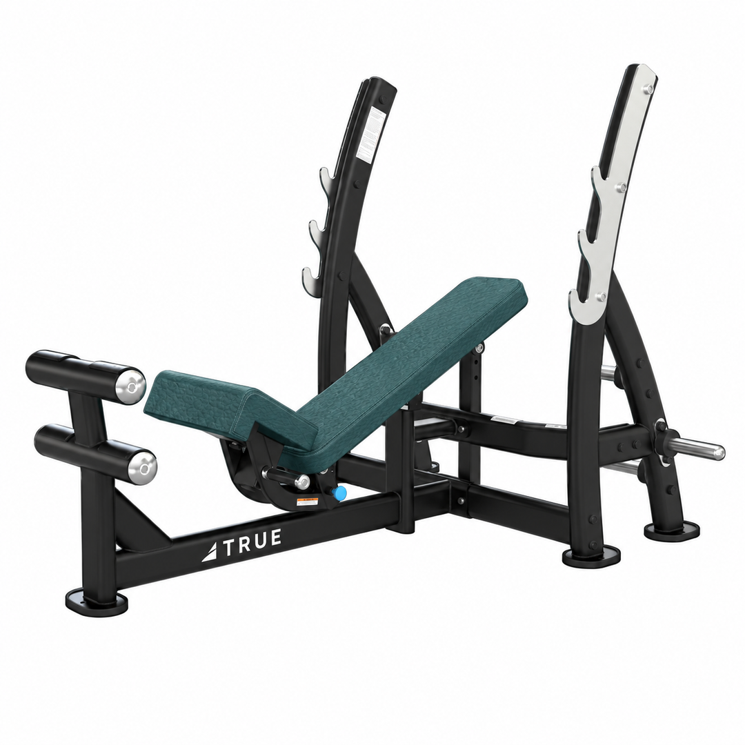 TRUE XFW-8200 3-way bench press with grotto teal upholstery, bar catches, footrest, and plate holders  
