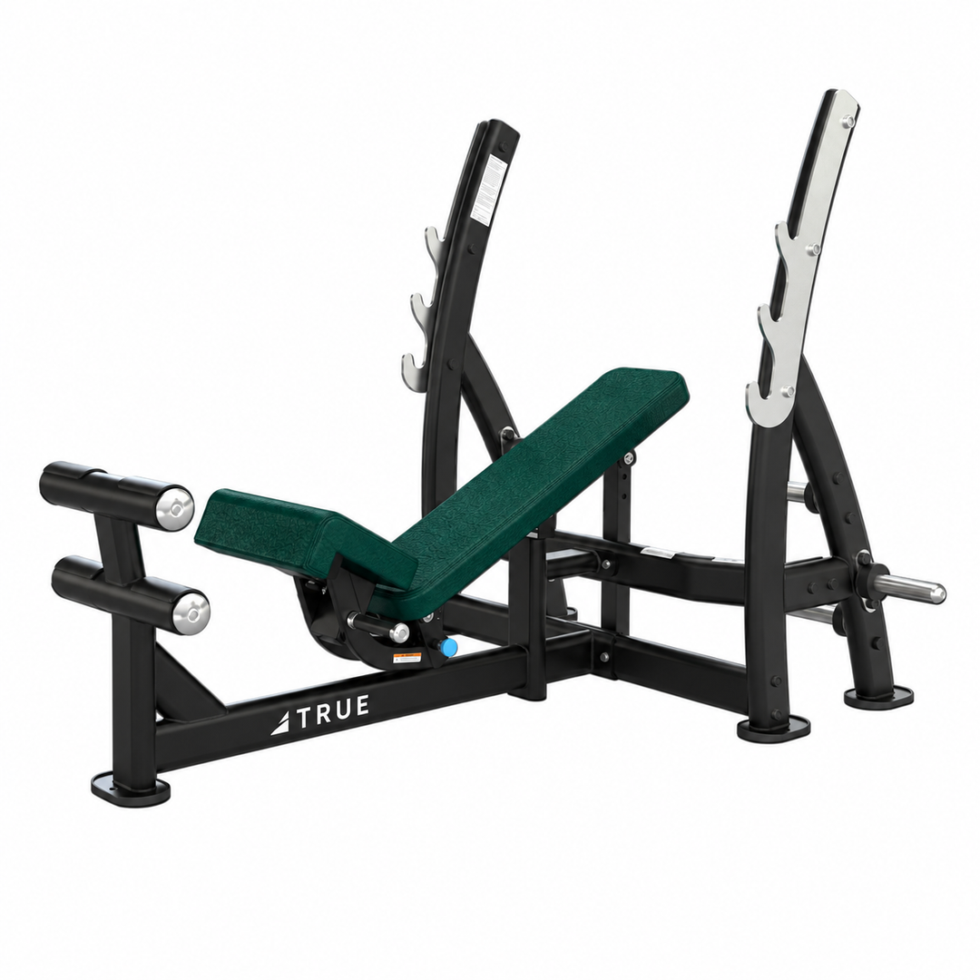 TRUE XFW-8200 3-way bench press with hunter green upholstery, bar catches, footrest, and plate holders  