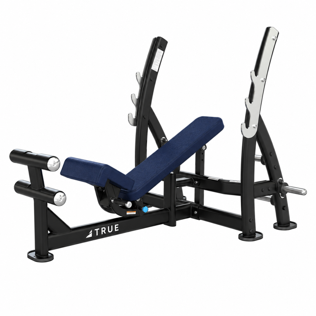 TRUE XFW-8200 3-way bench press with navy upholstery, bar catches, footrest, and plate holders  