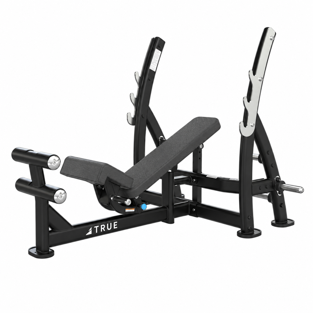 TRUE XFW-8200 3-way bench press with slate upholstery, bar catches, footrest, and plate holders  