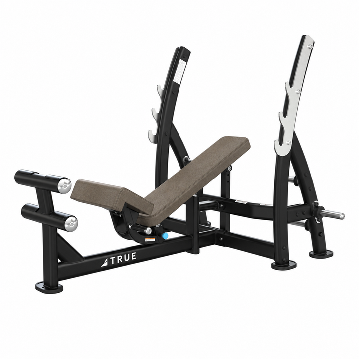TRUE XFW-8200 3-way bench press with suede upholstery, bar catches, footrest, and plate holders  