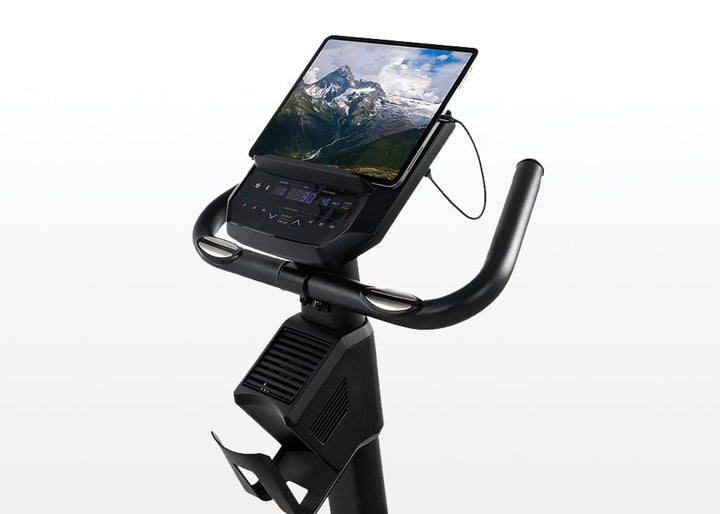 Tablet mounted on the Horizon 5.0U upright exercise bike console.
