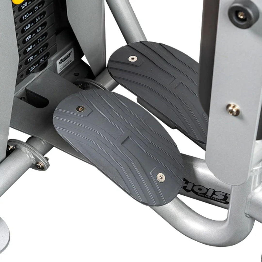 close up of thigh pads and footrests on inner outer thigh machine for user comfort