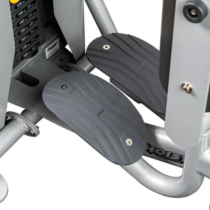 close up of thigh pads and footrests on inner outer thigh machine for user comfort