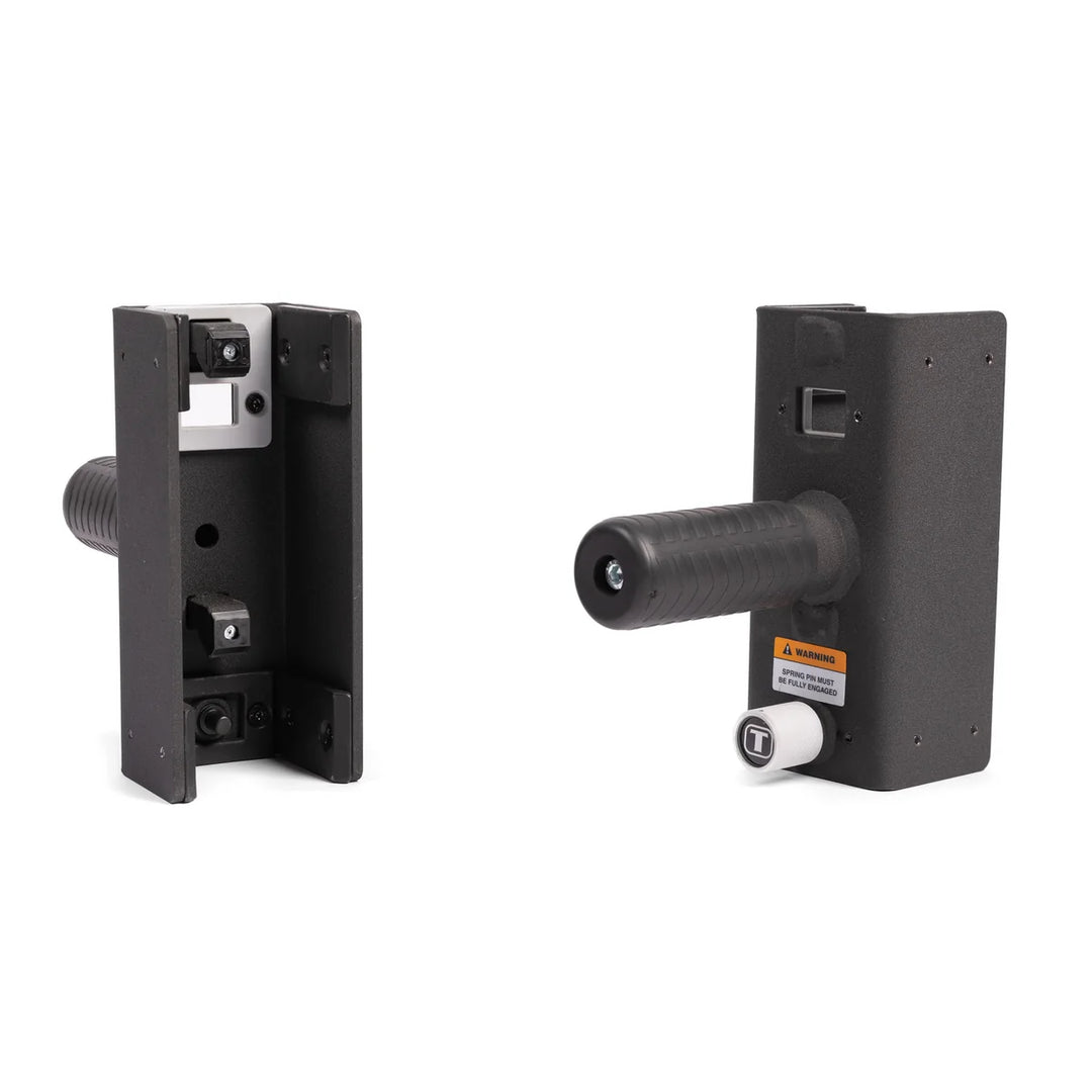 Two black Torque USA squat handle attachments shown from the side with mounting plates and cylindrical rubber grips.